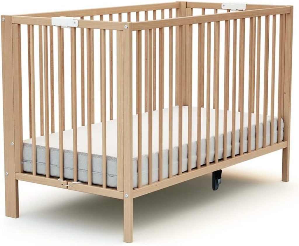 Test du lit bébé pliant AT4 essentiel : confort et praticité